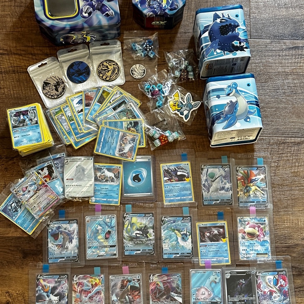 Pokemon Card Collection with Tins and Accessories 25 card Mystery Tin plus bonus